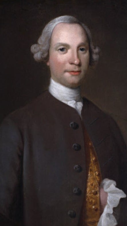 A painted oval, half-length portrait of the Reverend John Walrond.